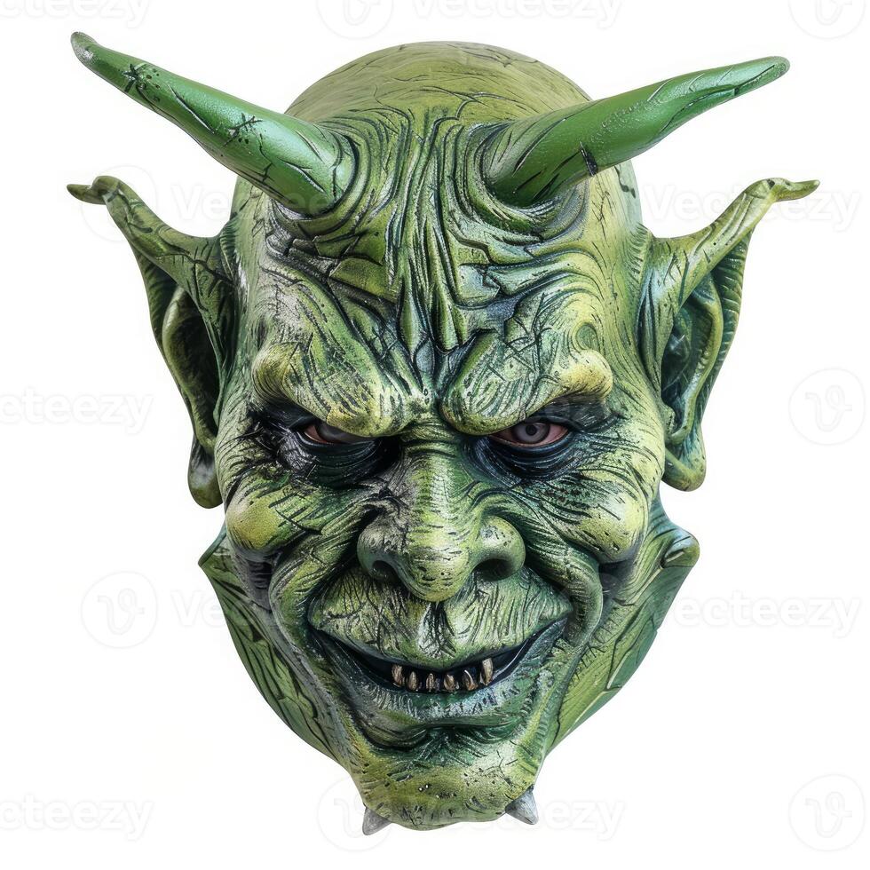Scary green monster mask grinning showing teeth photo