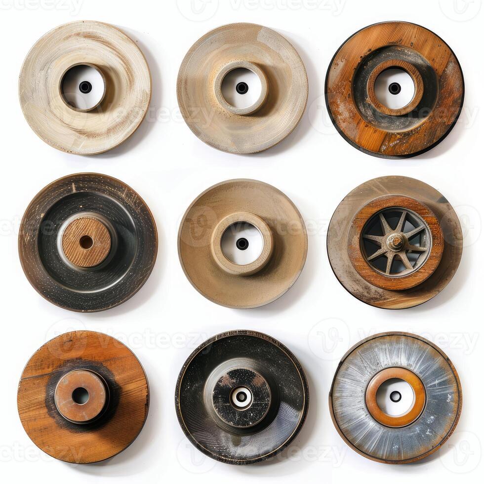 Nine different grinding wheels forming a wall displaying variations in industry photo