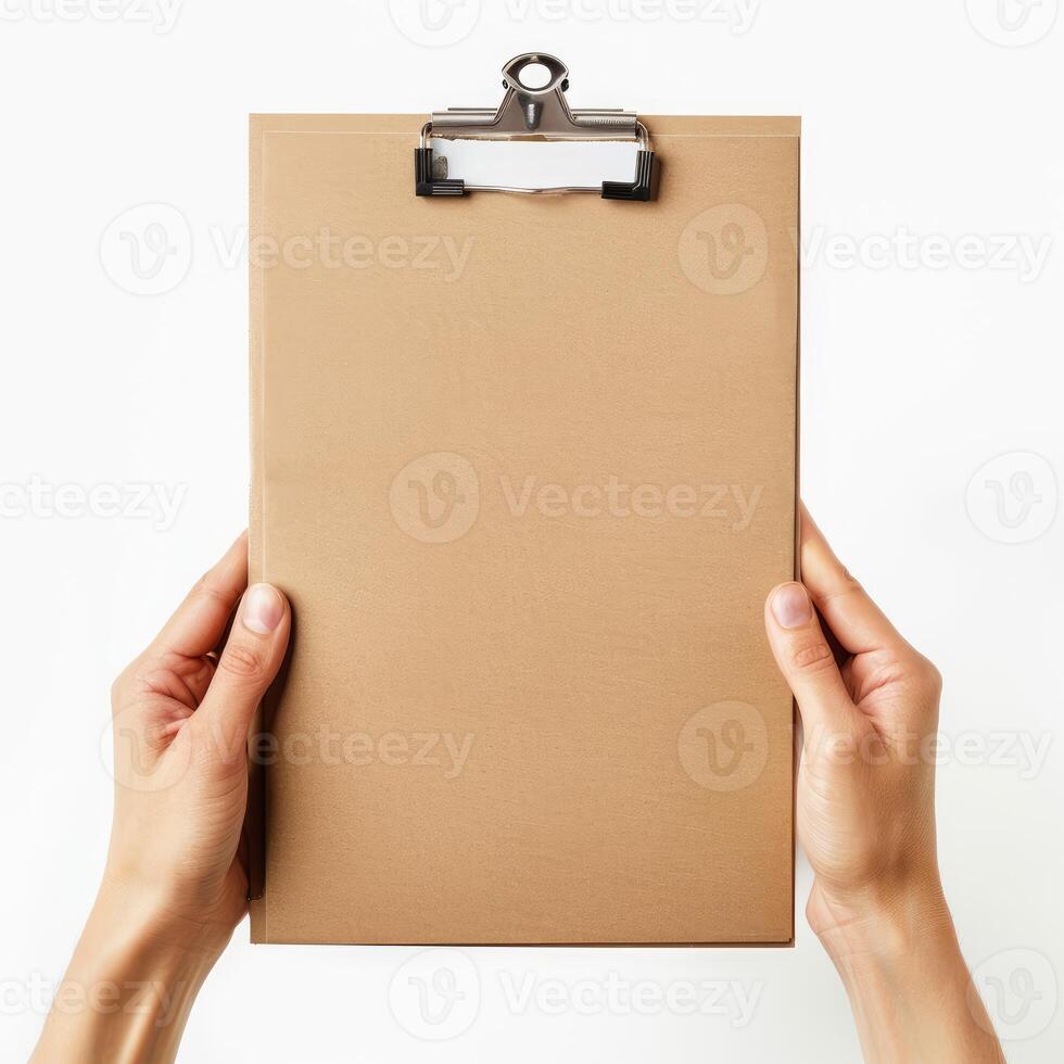 Businesswoman holding a clipboard with blank paper for copy space photo