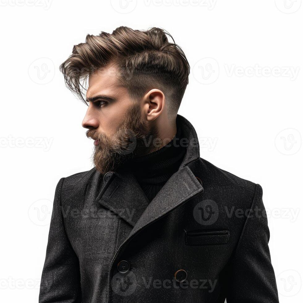 Bearded man with stylish haircut wearing black coat posing on white background photo