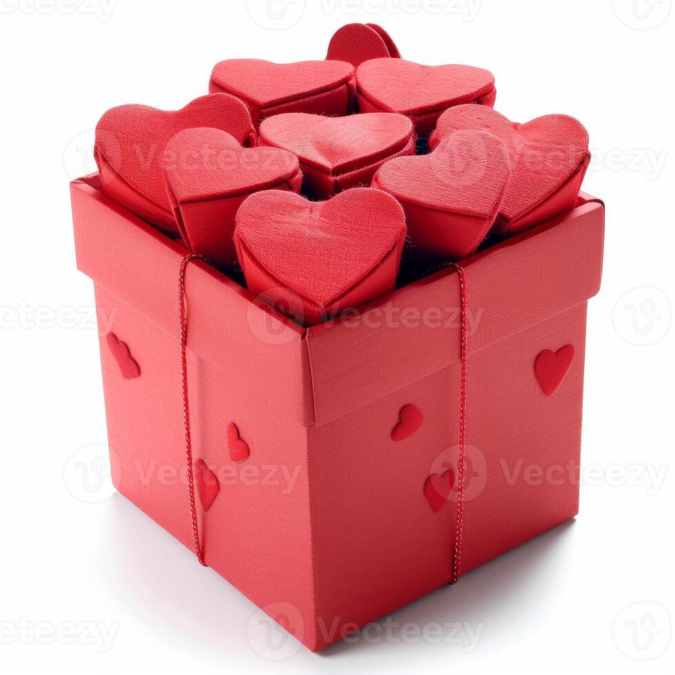 Red cardboard box overflowing with velvet hearts on white background photo
