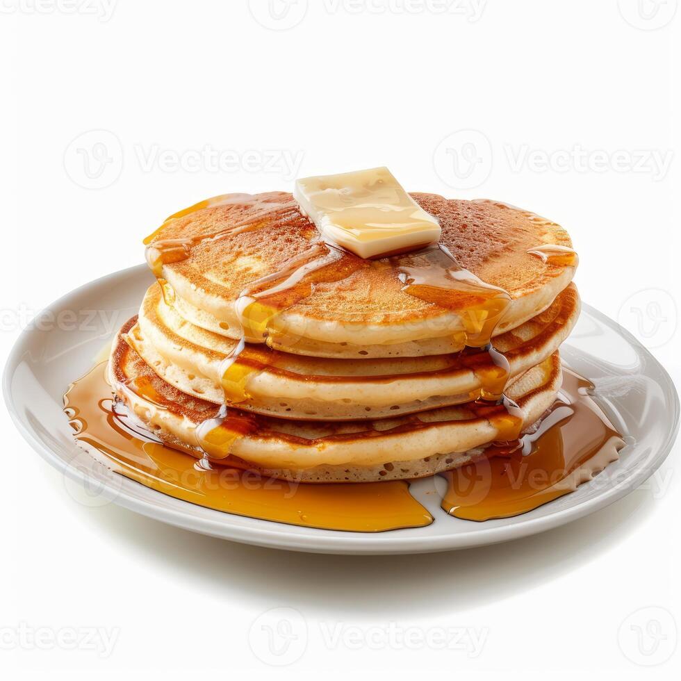 Stack of pancakes with melting butter and dripping syrup on white background photo
