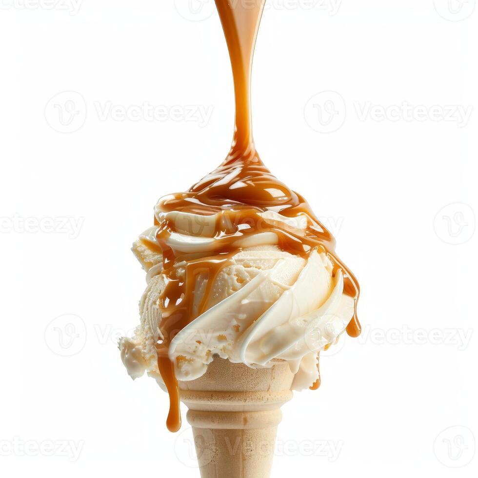 Delicious caramel sauce pouring over vanilla ice cream in cone on white background photo