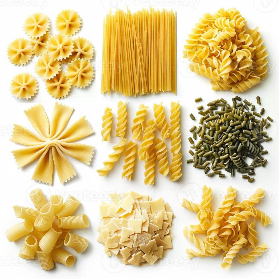 Variety of uncooked pasta shapes arranged on white background photo