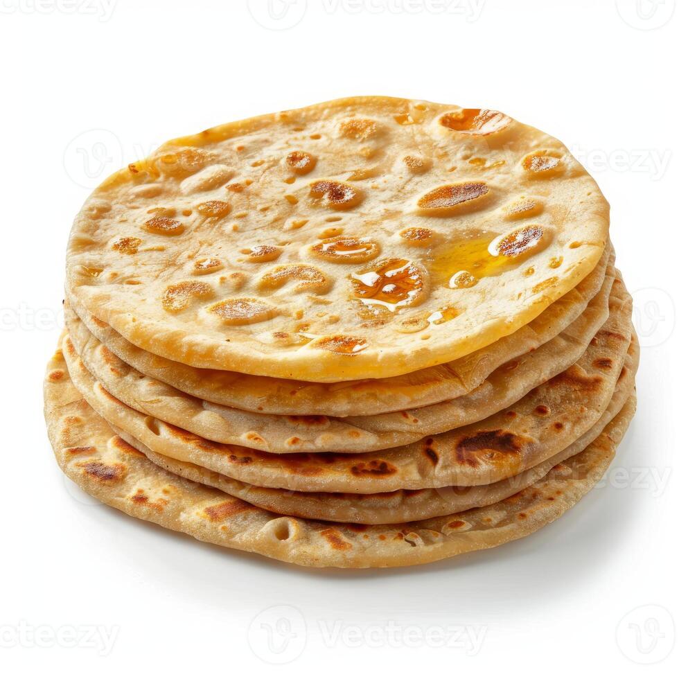 Stack of whole wheat chapati flatbreads with ghee topping photo