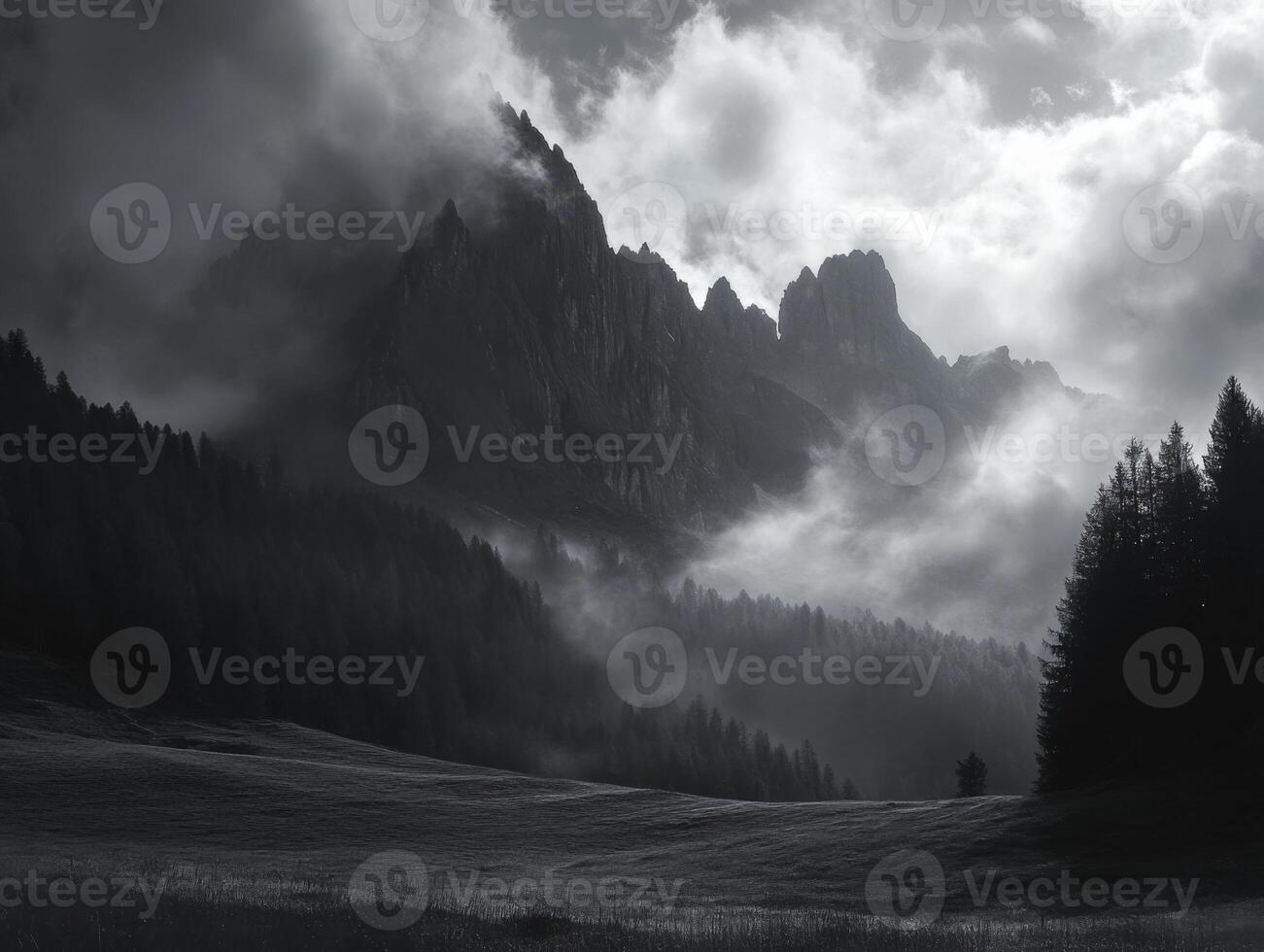 Misty Mountain Majesty, A grayscale landscape of a shrouded mountain range. photo