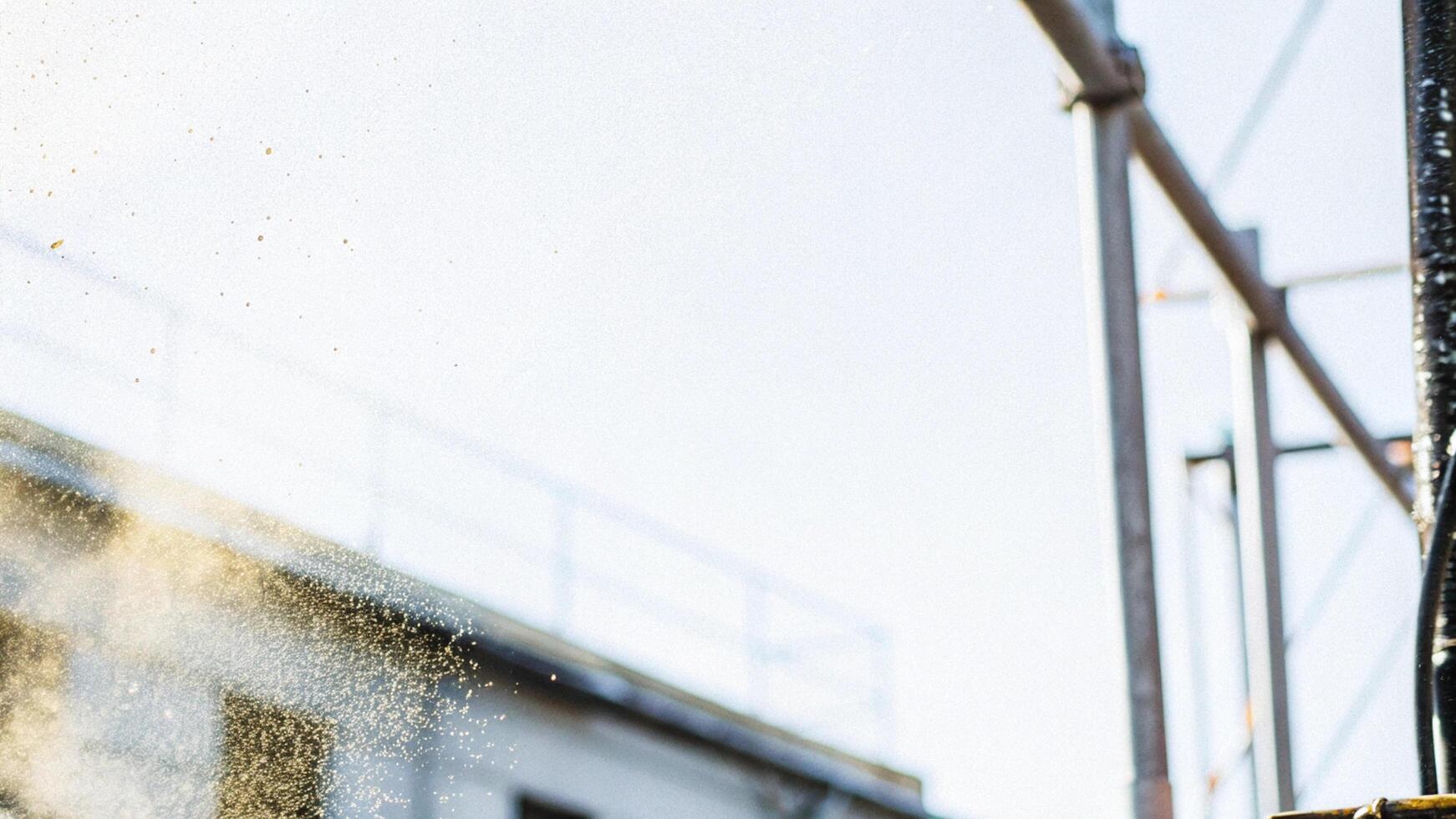 Close-up of dust on a city construction site, with the background blurred photo