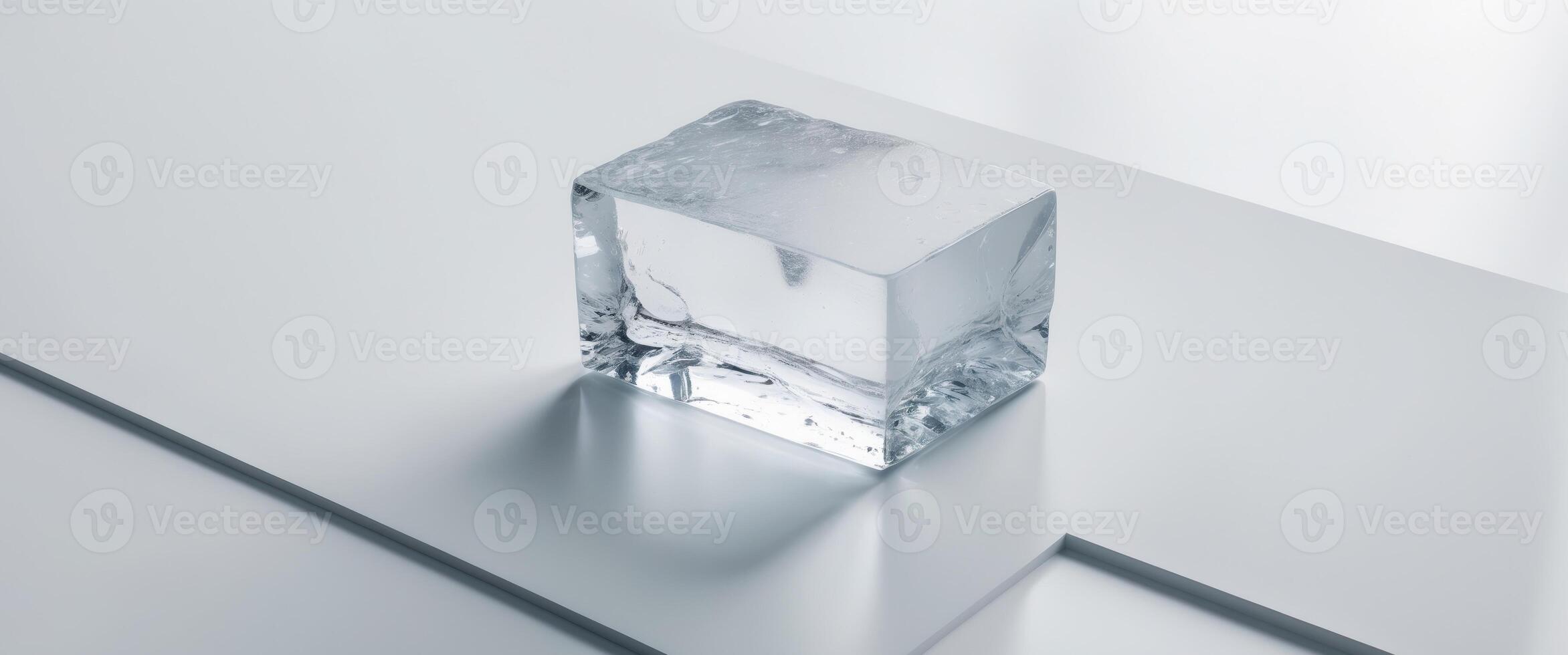Clear Ice Block on White Surface with Smooth Textures and Reflections photo