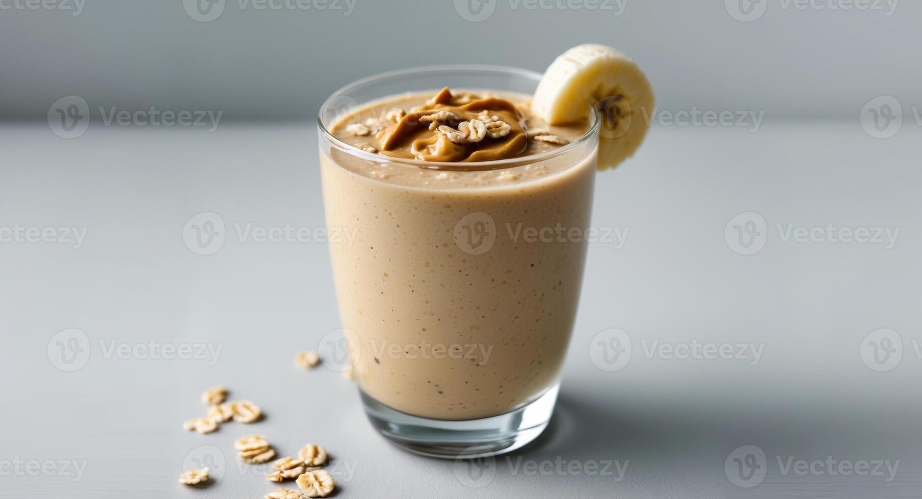 Delicious Banana Peanut Butter Oatmeal Smoothie in Glass. photo