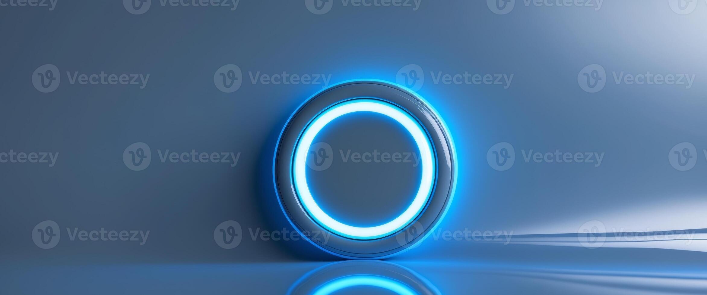 Circular neon light button with blue glow on a sleek surface photo
