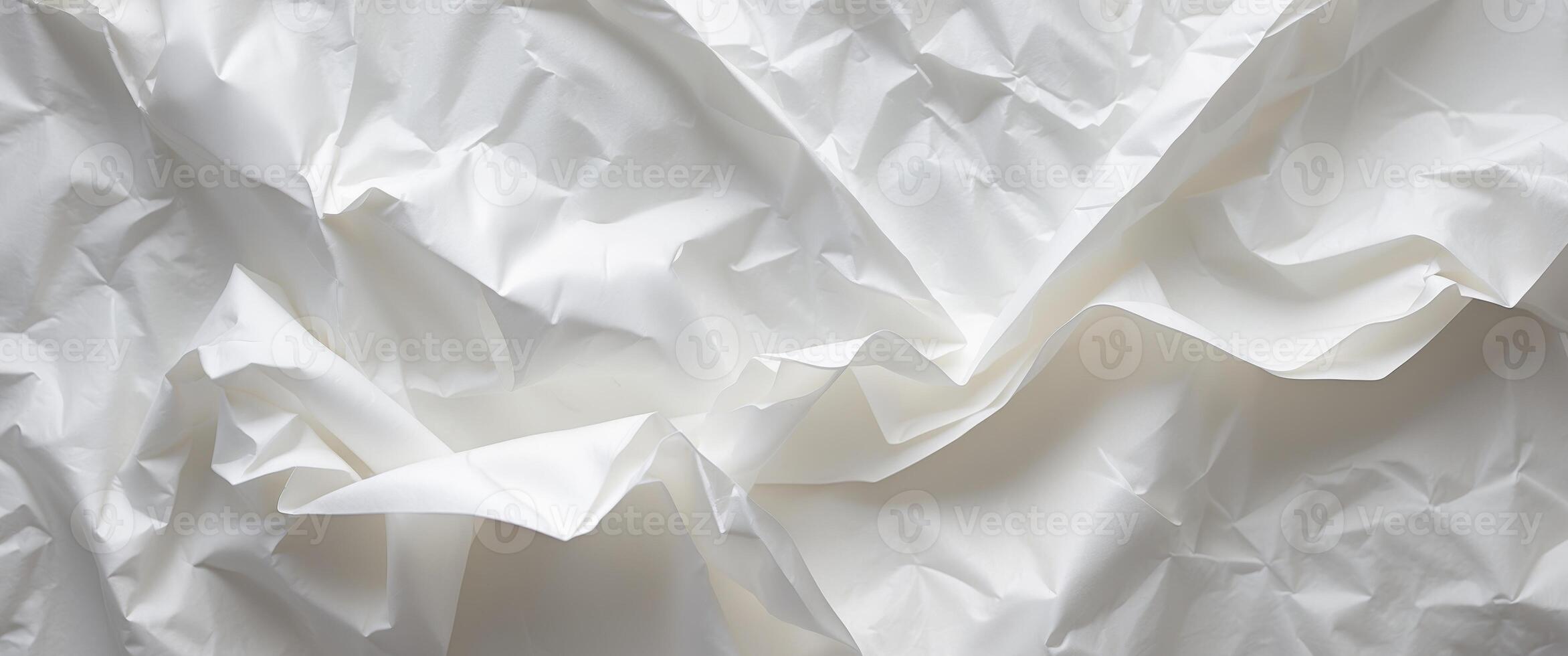 Crumpled white paper texture for backgrounds and designs photo