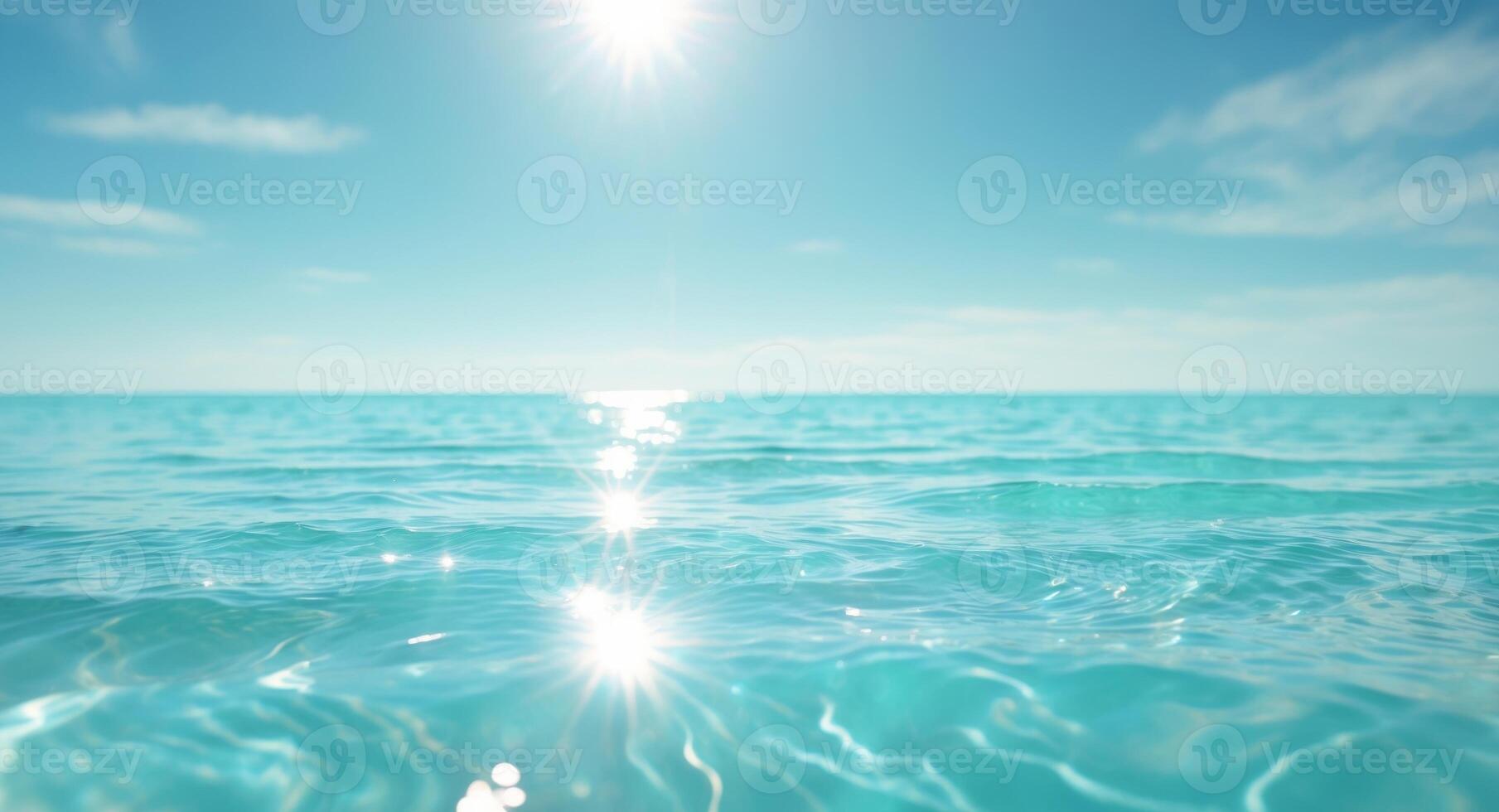 Crystal clear turquoise water reflects sunlight creating a mesmerizing seascape on a sunny day photo