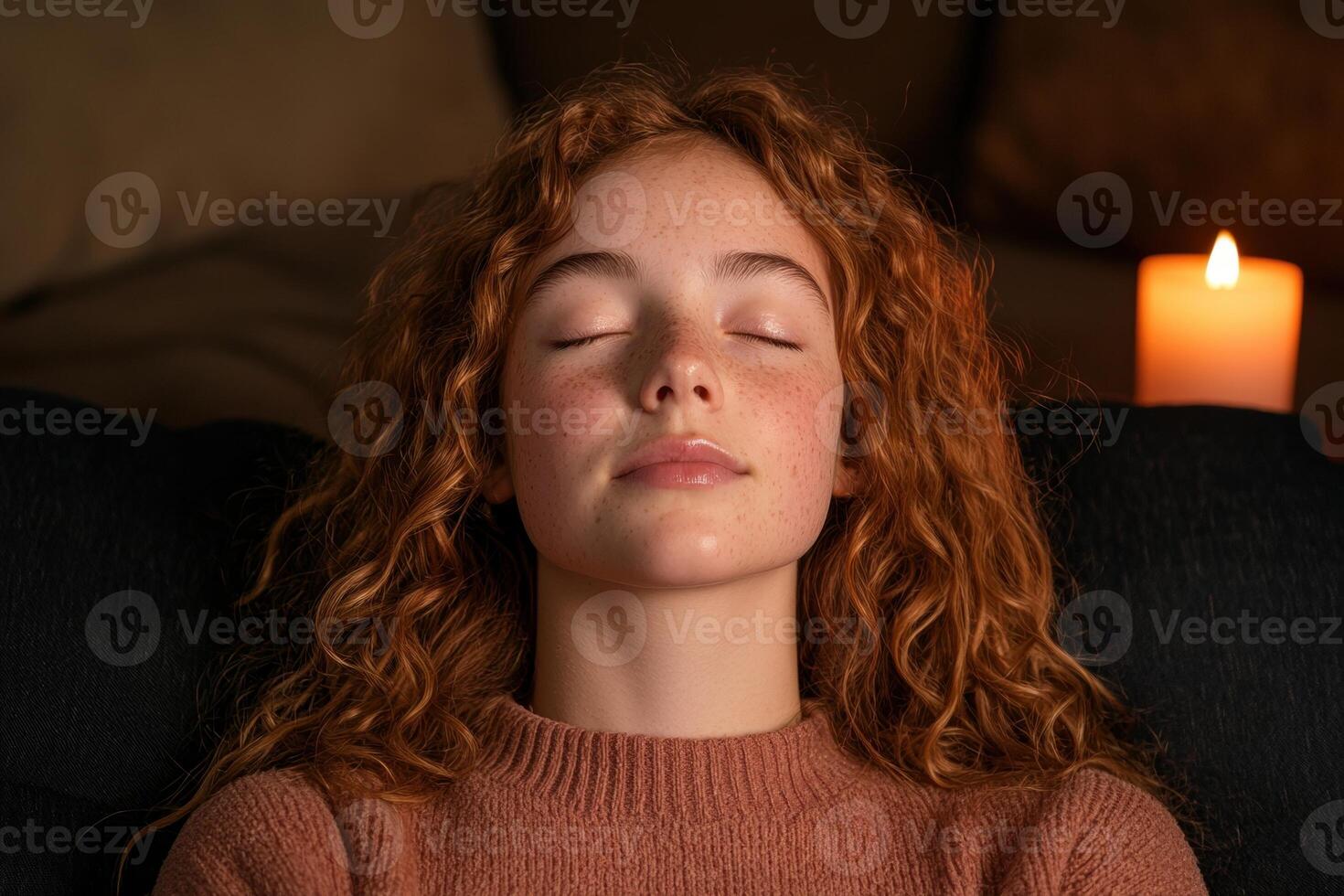 Teenage girl relaxing with eyes closed photo
