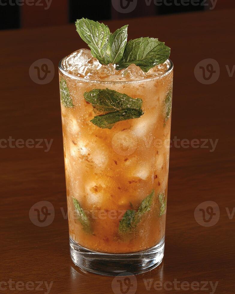 Refreshing mint julep cocktail in a tall glass with ice photo