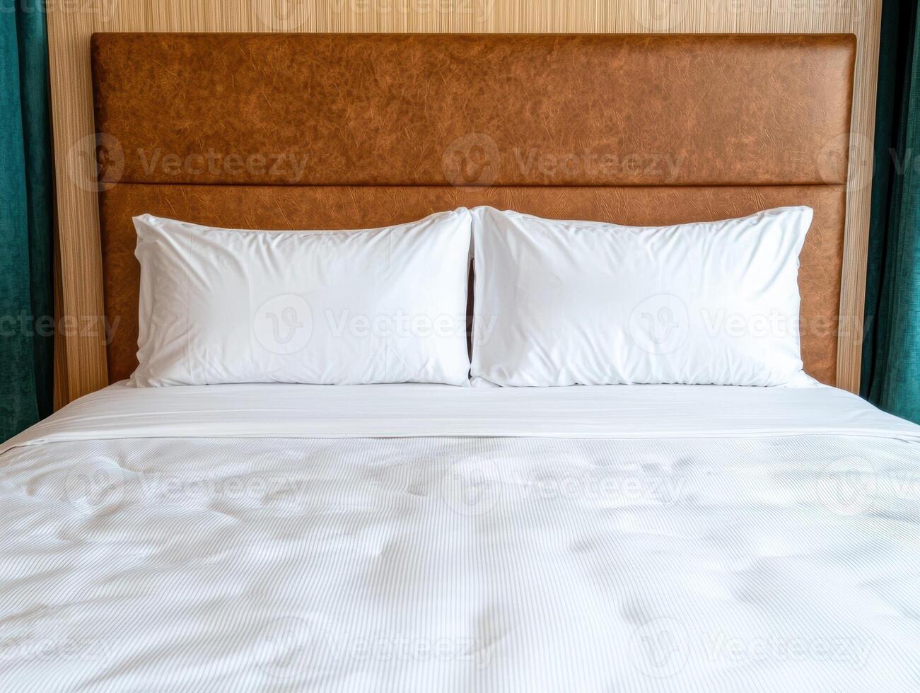 Luxurious hotel room with a comfortable bed and pillows photo