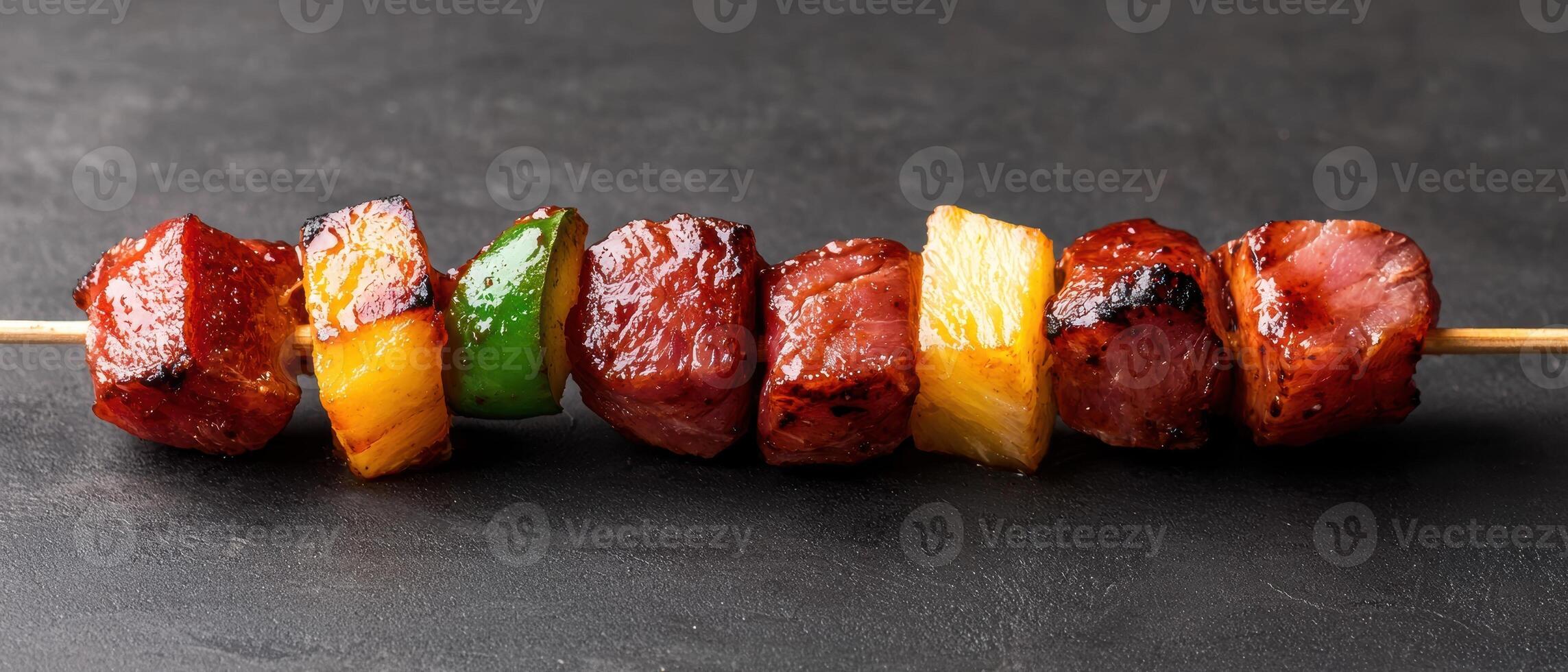 Delicious grilled meat and fruit skewers photo