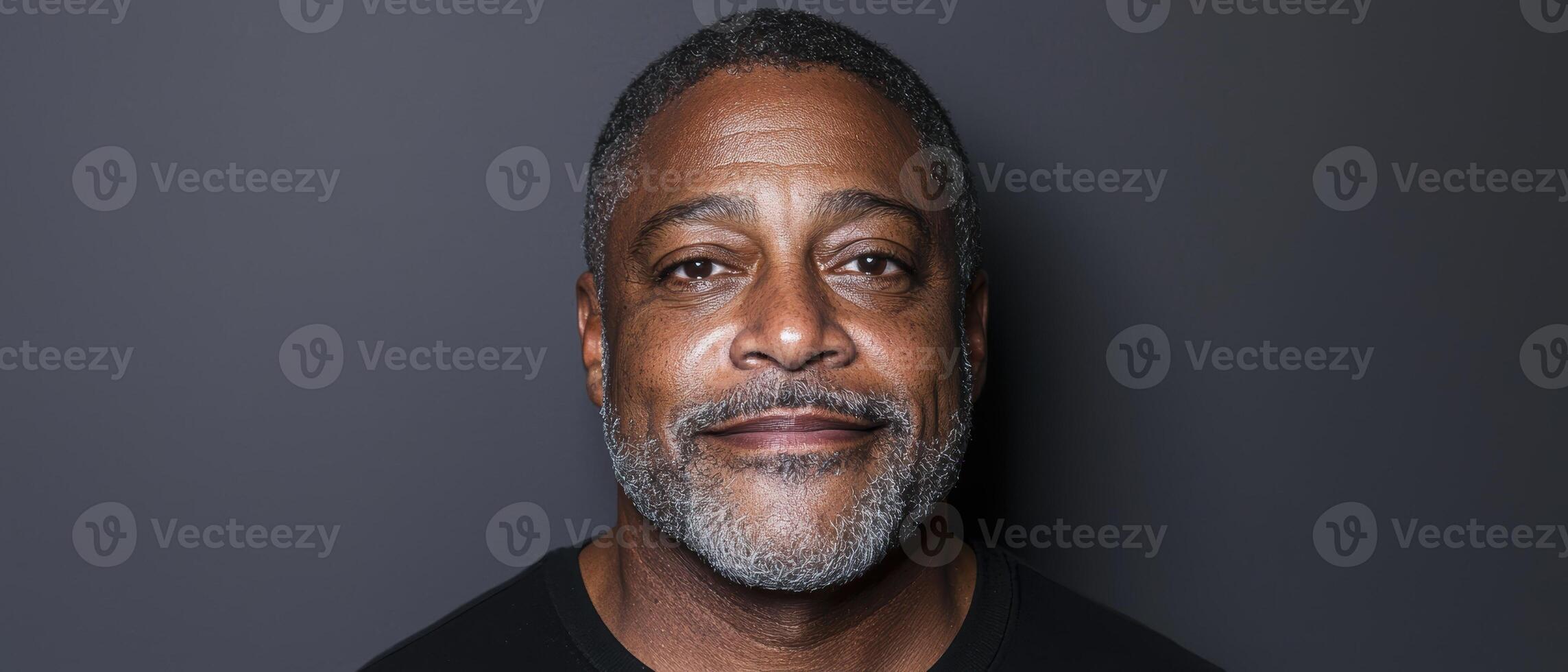 Portrait of a middle aged man with a gray beard photo