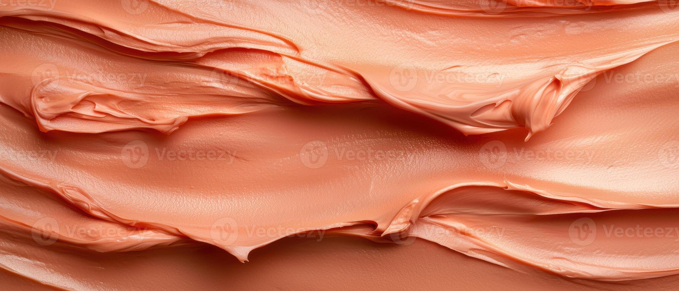 Close up of peach colored cream texture photo
