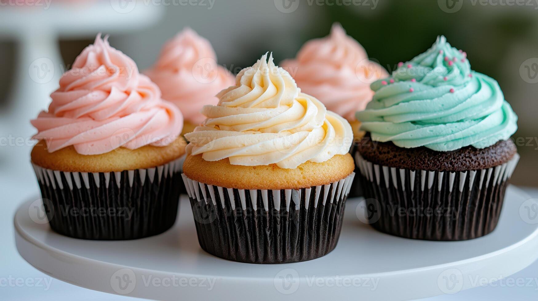 Delicious cupcakes with creamy frosting. photo