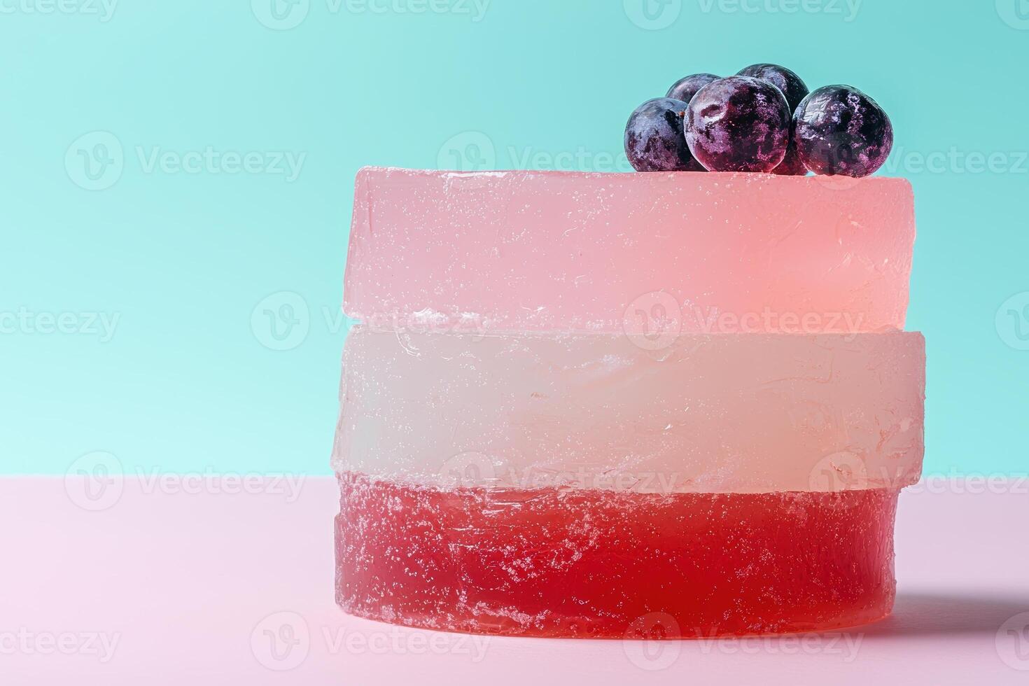 Layered translucent soap with grapes on top photo