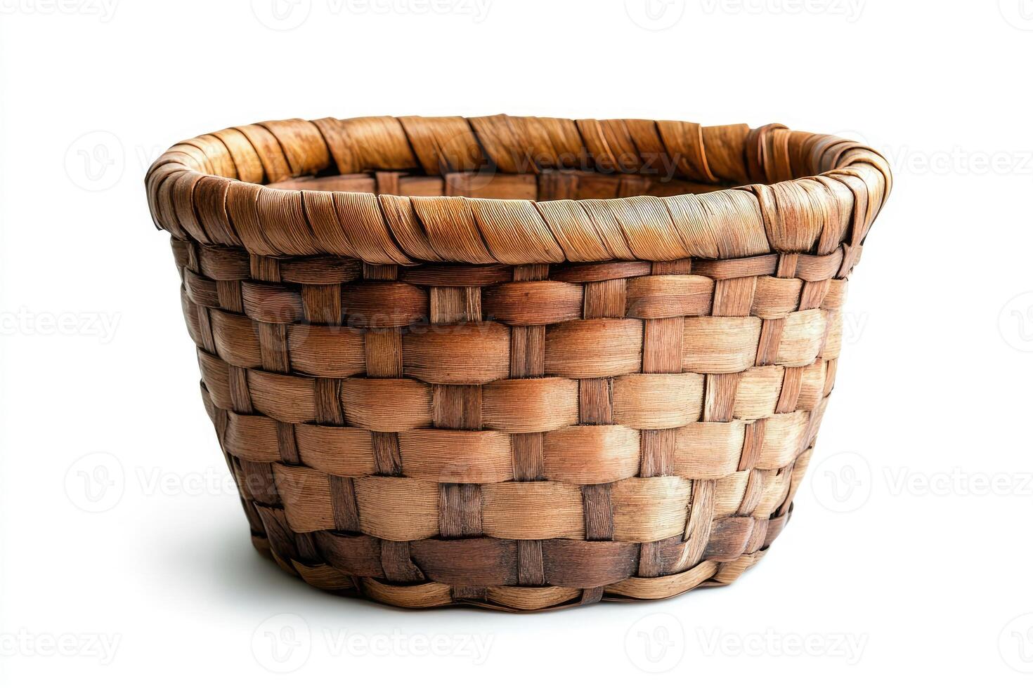 Empty wicker basket isolated on white background representing simplicity and craftsmanship photo
