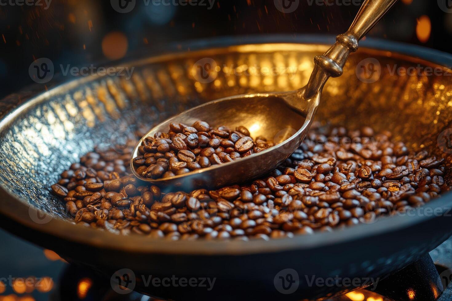 Roasting coffee beans with a metal spoon in a bowl over fire photo