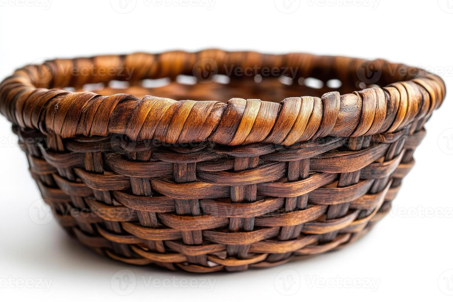 Empty wicker basket isolated on white background representin.g simplicity and craftsmanship photo