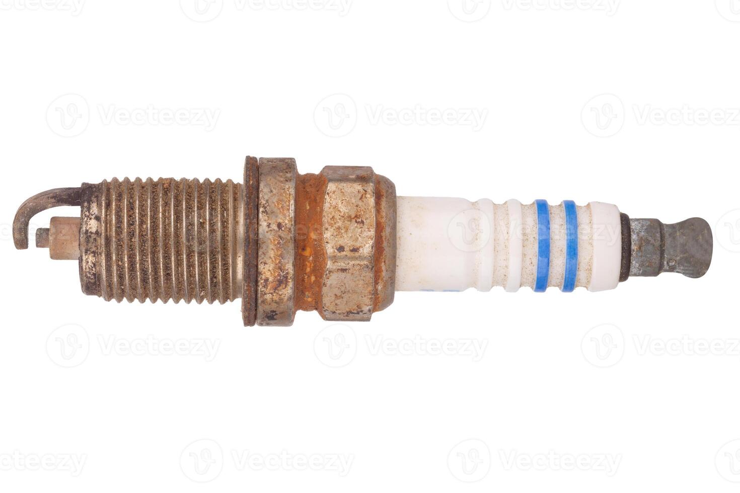 Side view of rusty spark plug with corrosion photo
