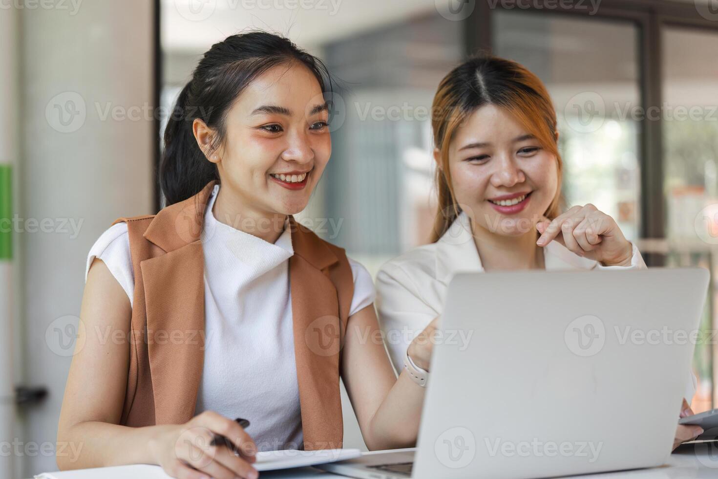 Accounting Team Collaborating on Financial Reports in a Modern Office Environment photo