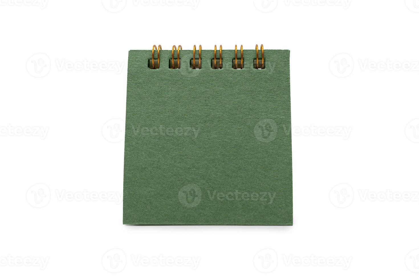 Blank green desk calendar with Clipping path isolated on white background. Calendar concept with copy space for text or infographic. photo