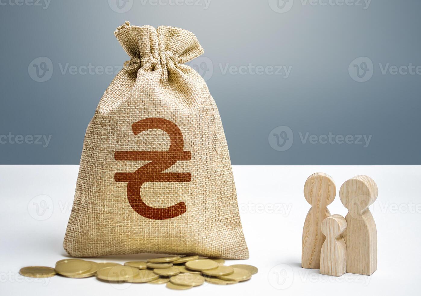 Ukrainian hryvnia money bag with money and family figurines. Financial support for social institutions. Investments in human capital, culture and social projects. Providing assistance to citizens. photo