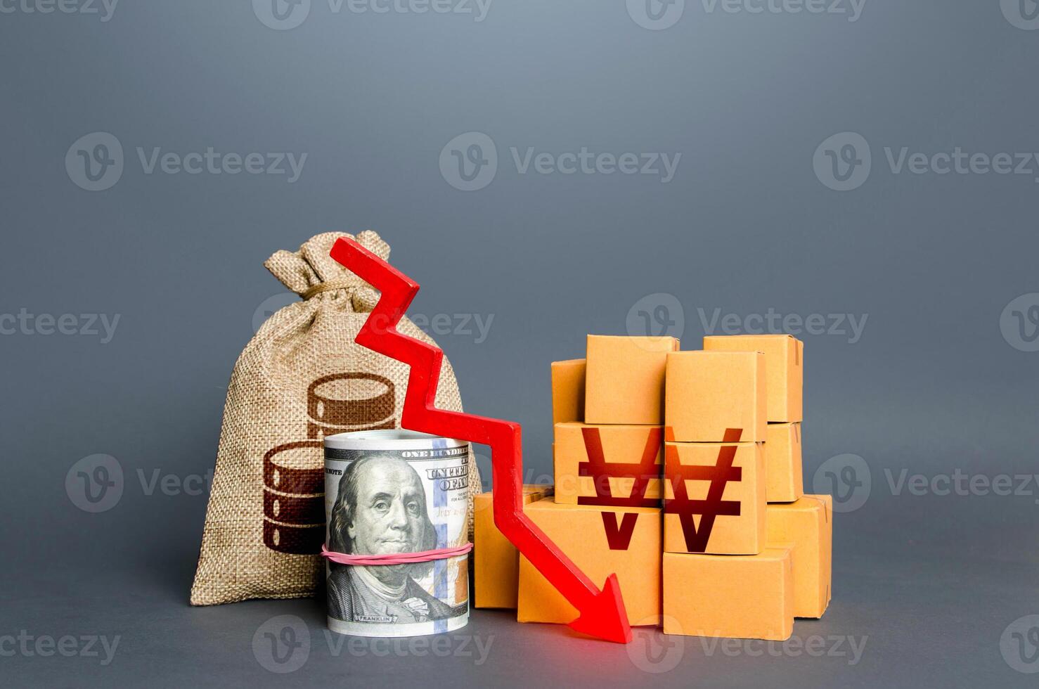 South korean won money with goods and an arrow down. Falling profits. Reduction in consumption, trade imbalance. Low sales. Import export. Taxes. National economy fall. Production decline. photo