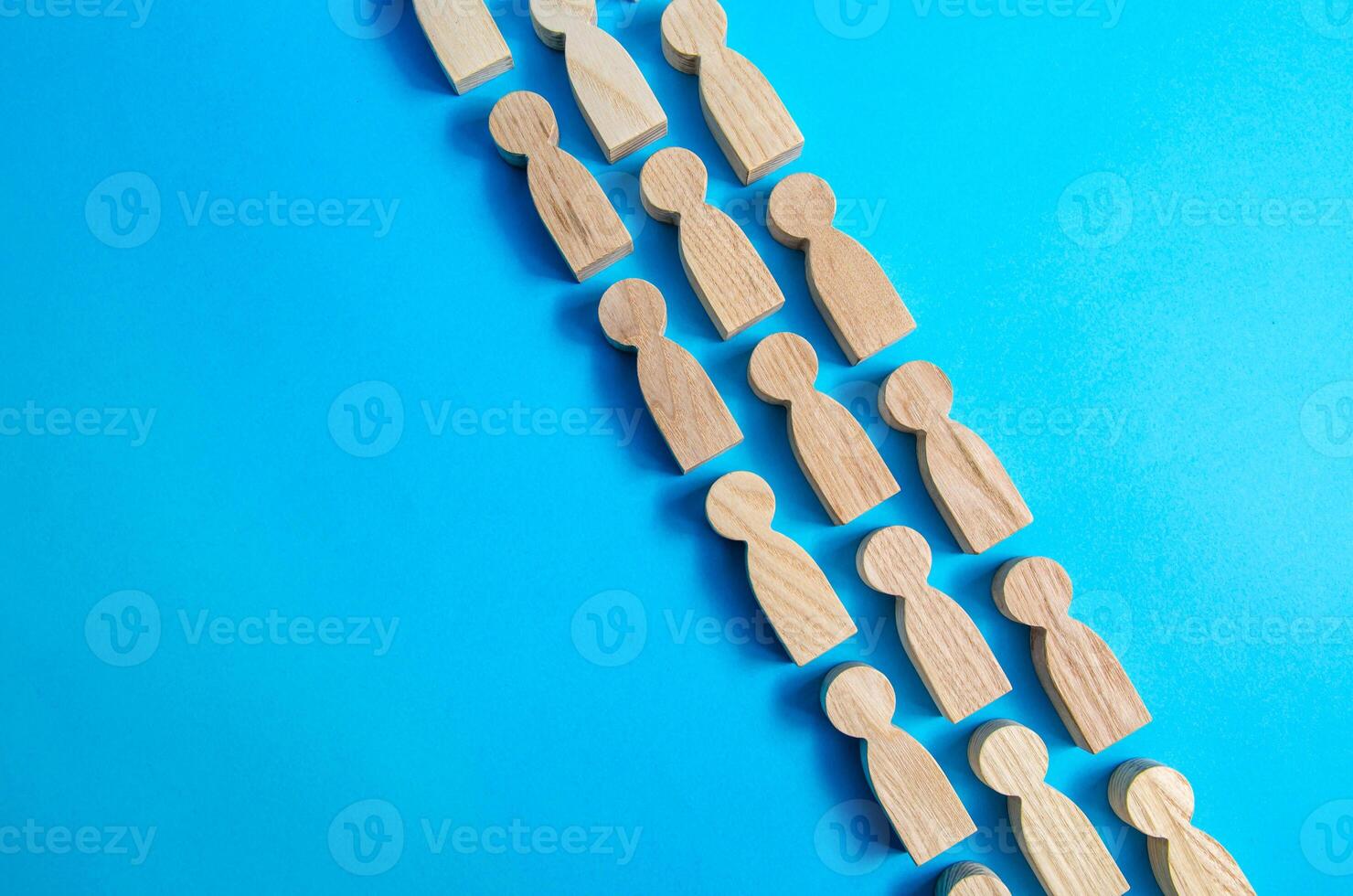 People lie in a line. Social movement, follow. Human resources. Unity. Discipline. Social organization, joining consolidated forces. Team building, teamwork. Common cause. Cooperation. photo