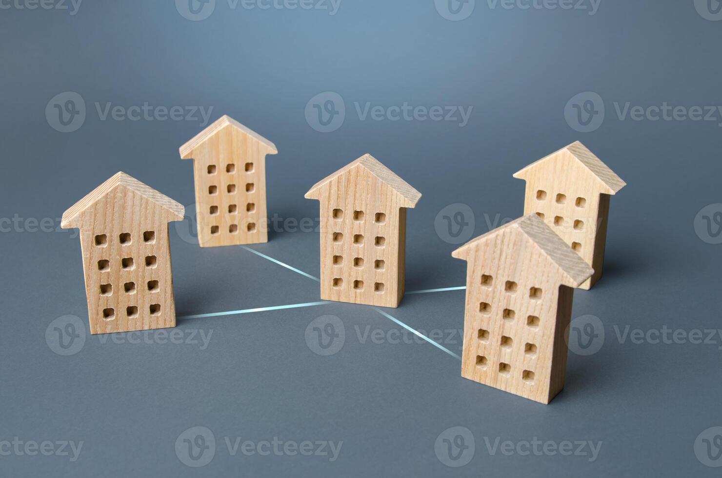 Houses connected by lines. Association of residential into a common organization, public service management company. Internet service communication. IoT. Utilities. Consolidation of households photo