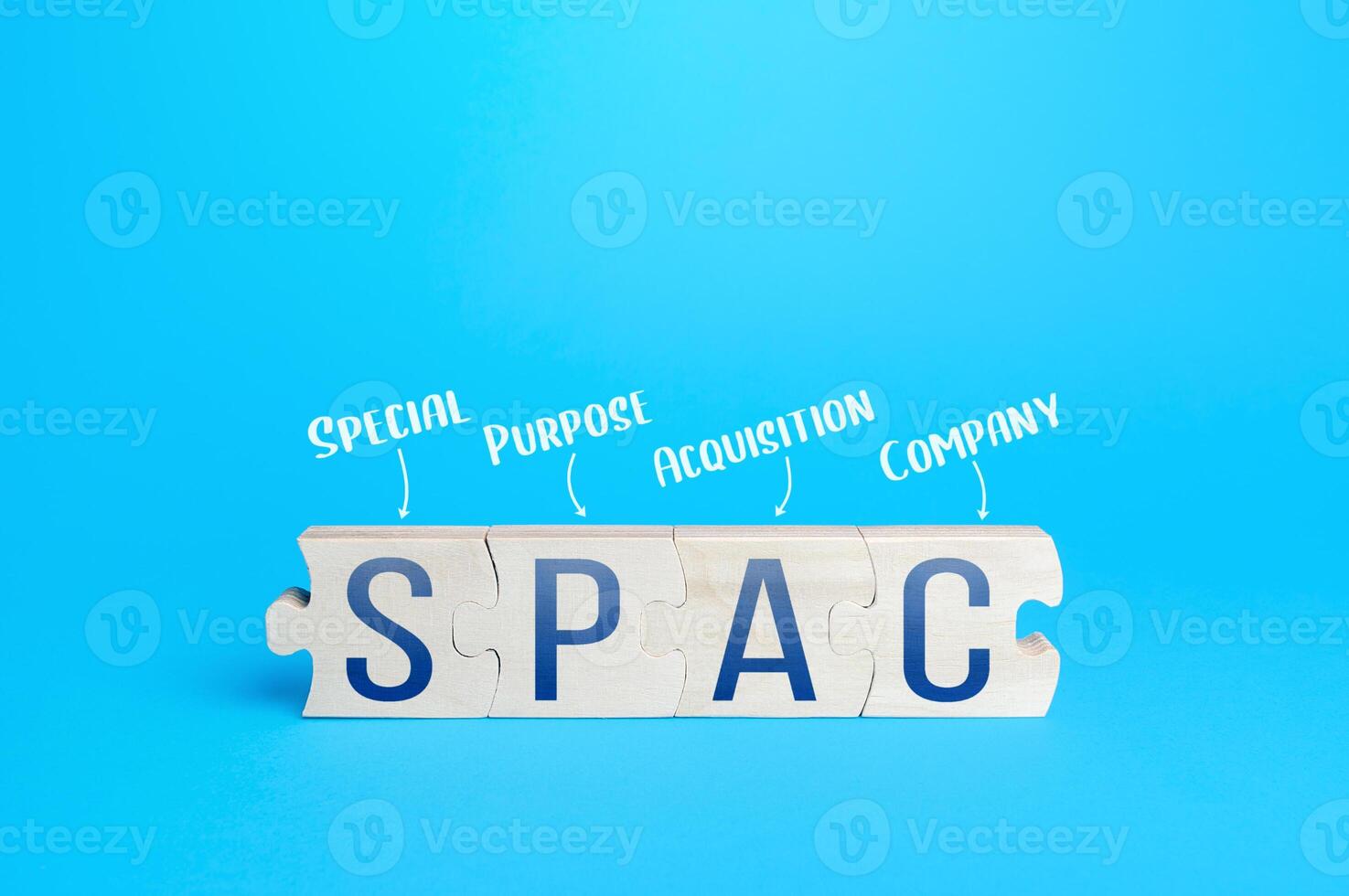 Wooden puzzle blocks with abbreviation SPAC Special purpose acquisition company. Simplified listing of company, merger bypassing stock exchange IPO. Assessment of benefits and risks of investments photo
