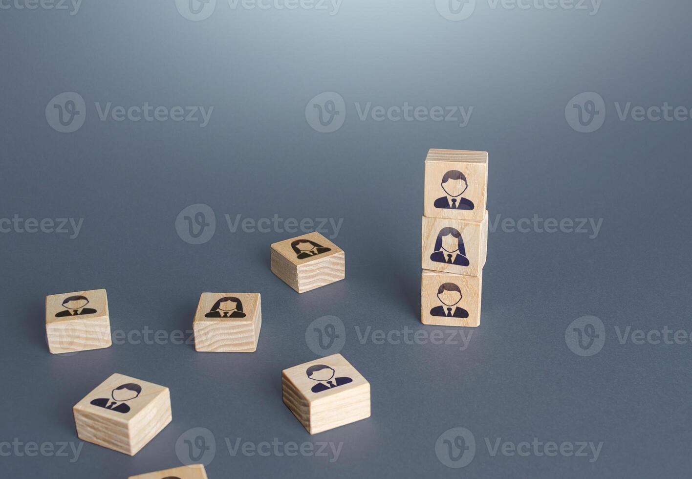 Figurine blocks with employees. Personnel recruitment concept. Team building. Company organization. Hiring, recruiting. Feminization of workforce. Reorganization. Leadership in management. photo