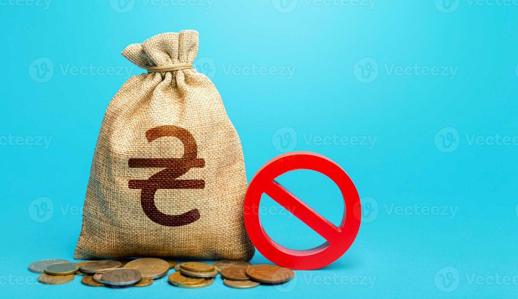Ukrainian hryvnia money bag and red prohibition sign NO. Monitoring suspicious money flows. Termination projects. Confiscation of deposits. Monetary restrictions, freezing of bank accounts. photo