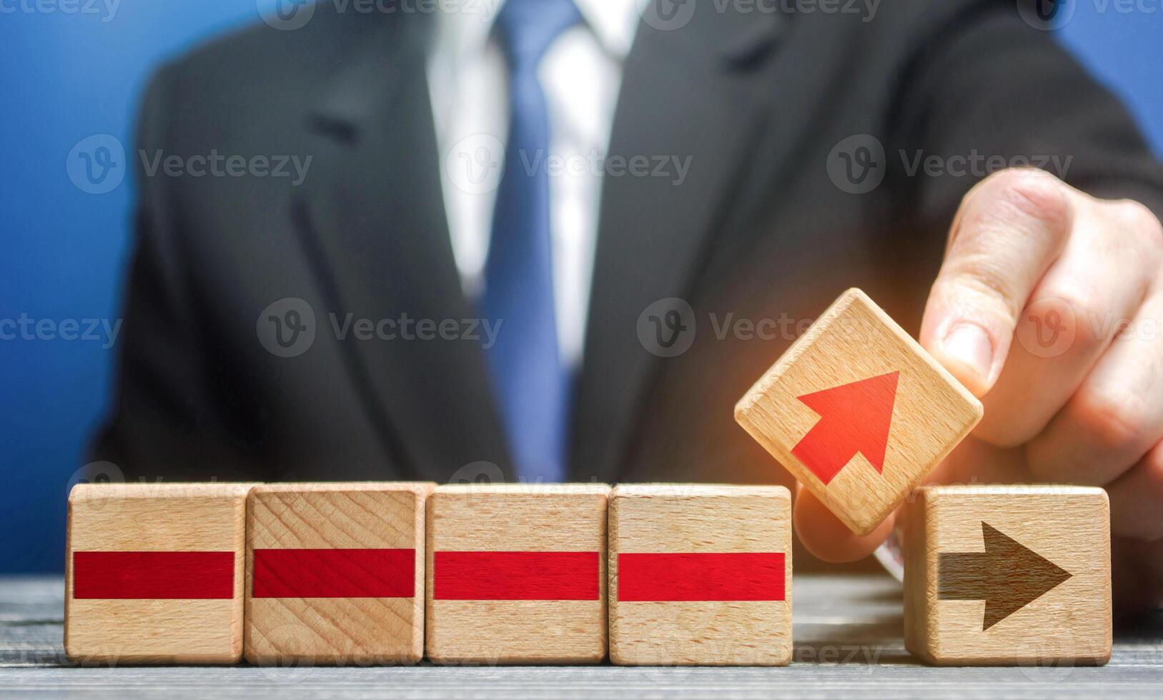 Businessman makes changes to the business process on an alternative path. Defining a new action plan and strategy. Revision of business chains structure, improvement of efficiency, reduction in price. photo