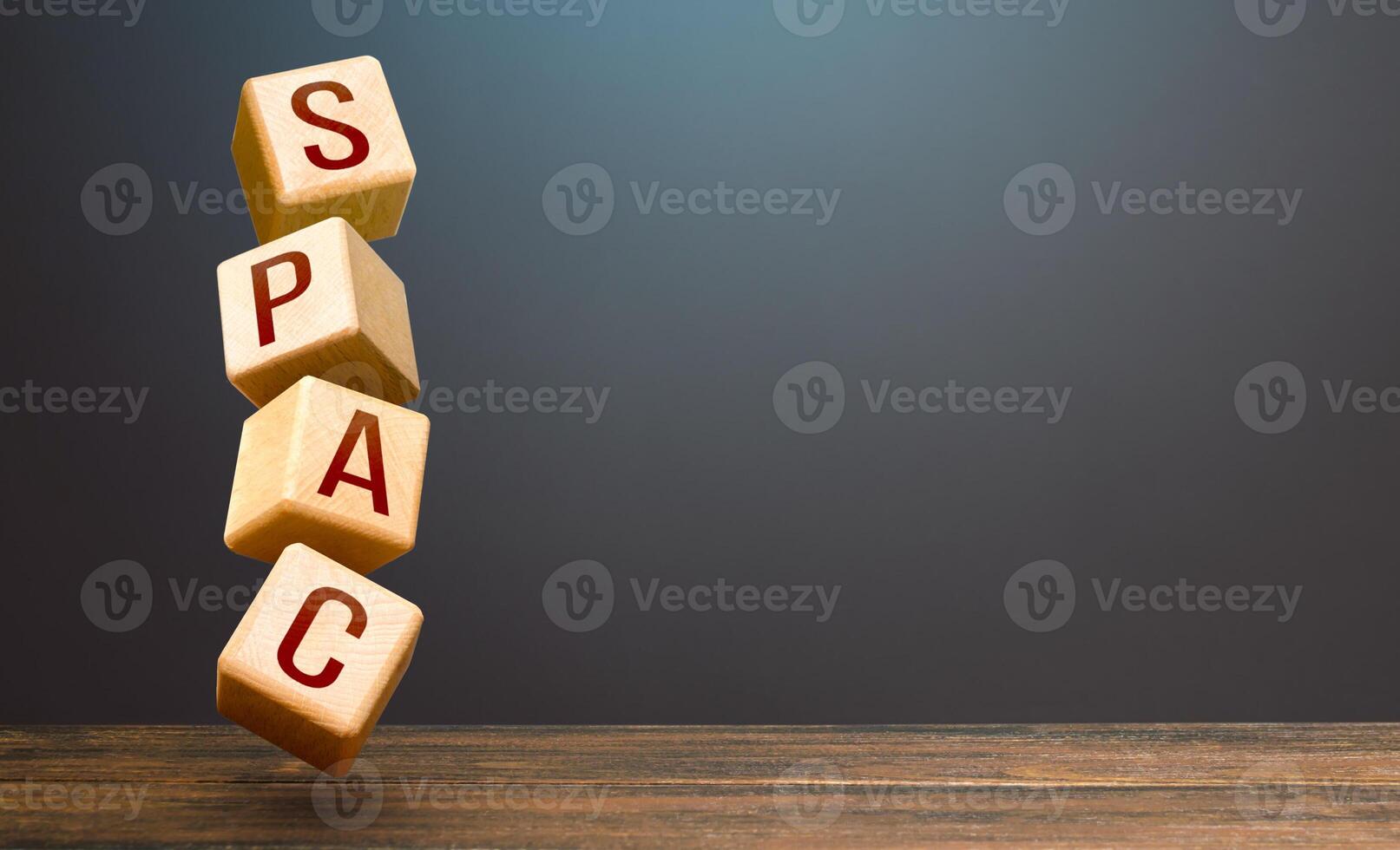 Wooden blocks with word SPAC. Special-purpose acquisition company. A easy way stock exchange financial instrument for attracting investments. Development of new simplified procedures for investment photo
