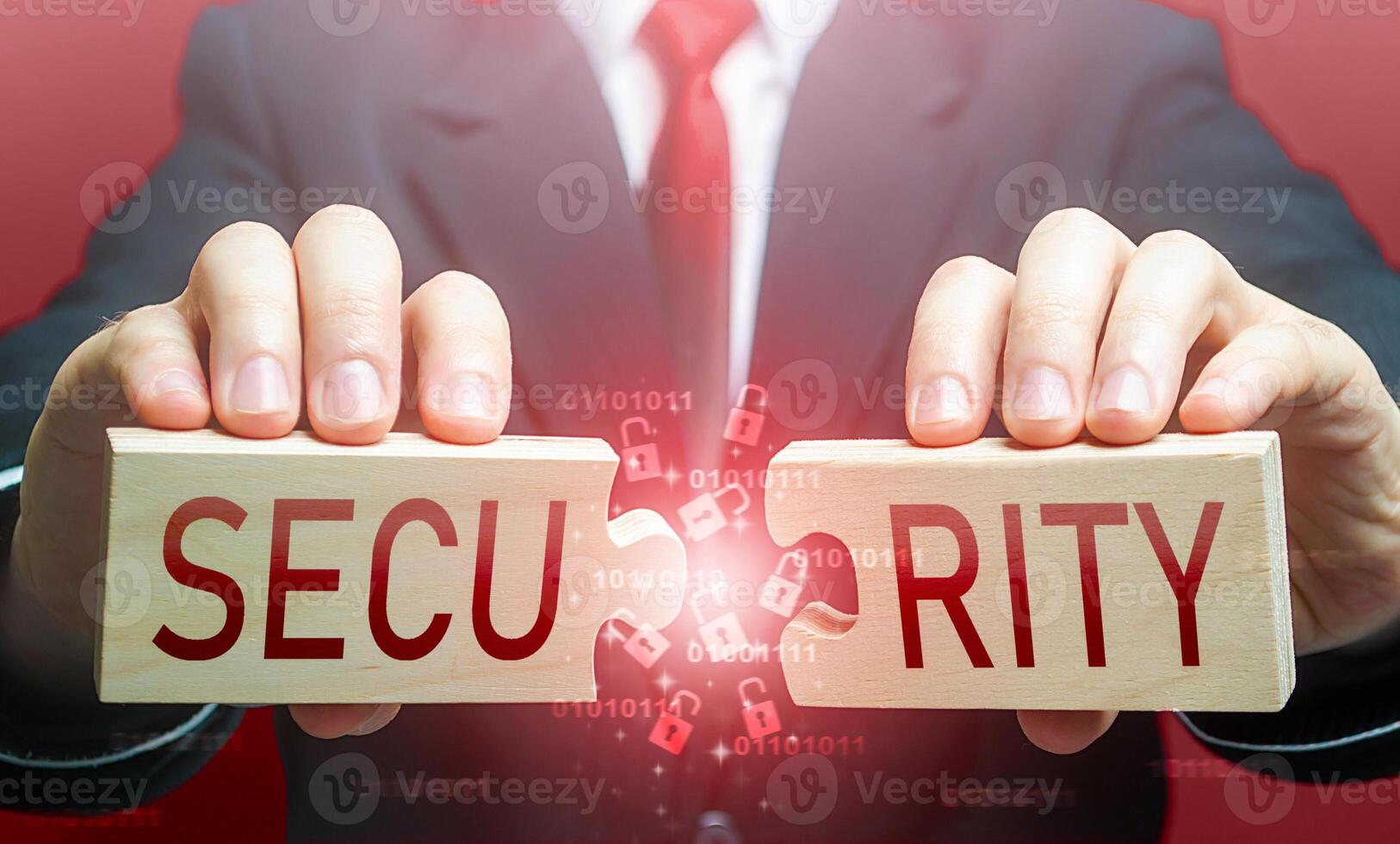 Man breaks the puzzle with word SECURITY. Security breach, hacker attack and data leak. Bypassing protection, hacking networks. Damage, disruption of work. Hybrid war. Vulnerability risks. Signaling photo