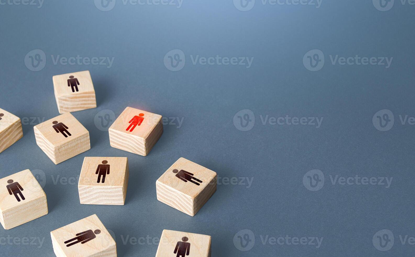 Red highlighted man among randomly people blocks. Recruiting, staffing. Human resources. Employment agency. Finding infected people. Hiring talented professional candidate for a vacant job position. photo