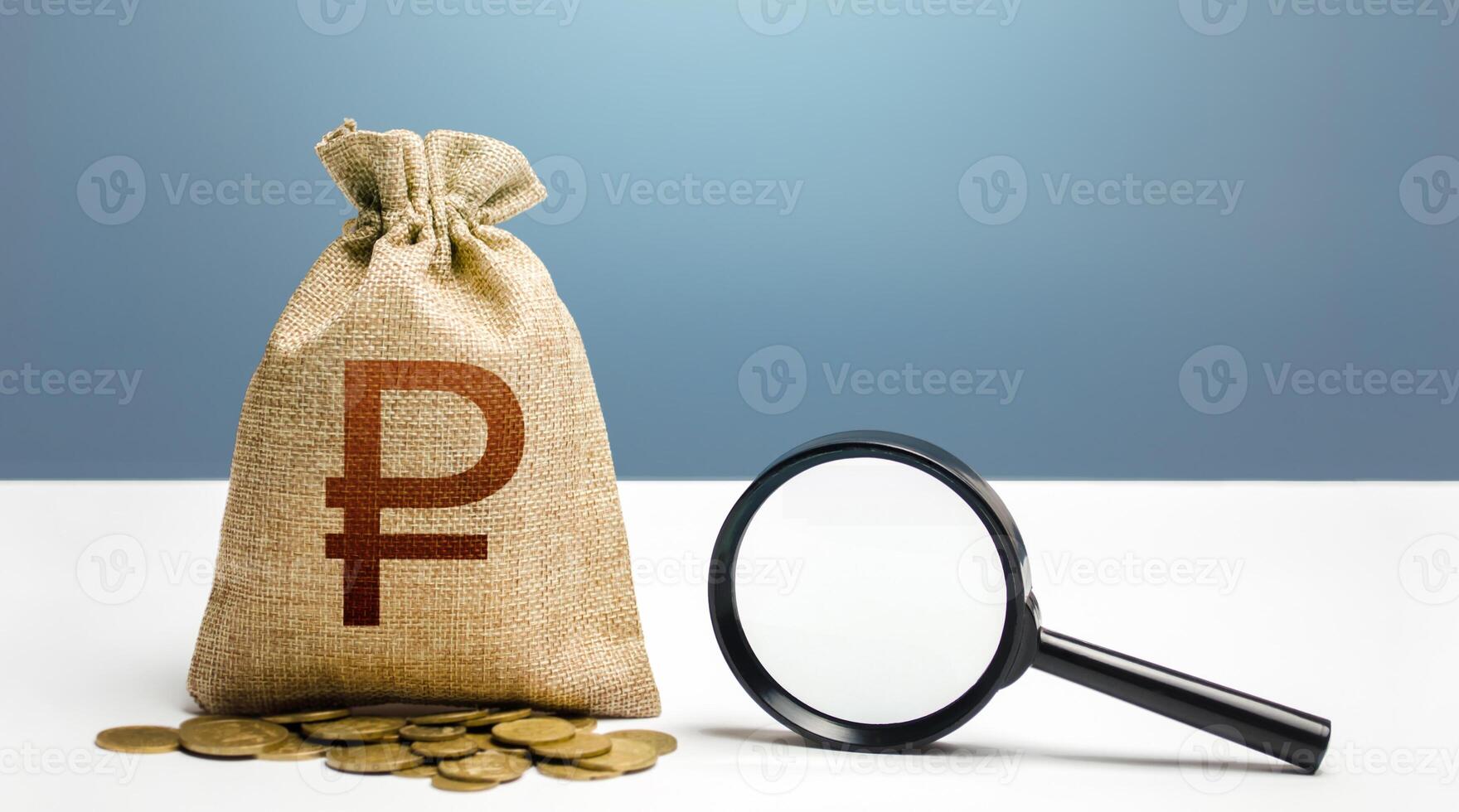 Russian ruble money bag and magnifying glass. Financial audit and monitoring of suspicious capital and transactions. Search for beneficiaries. Budget check. Attracting investments financing. photo