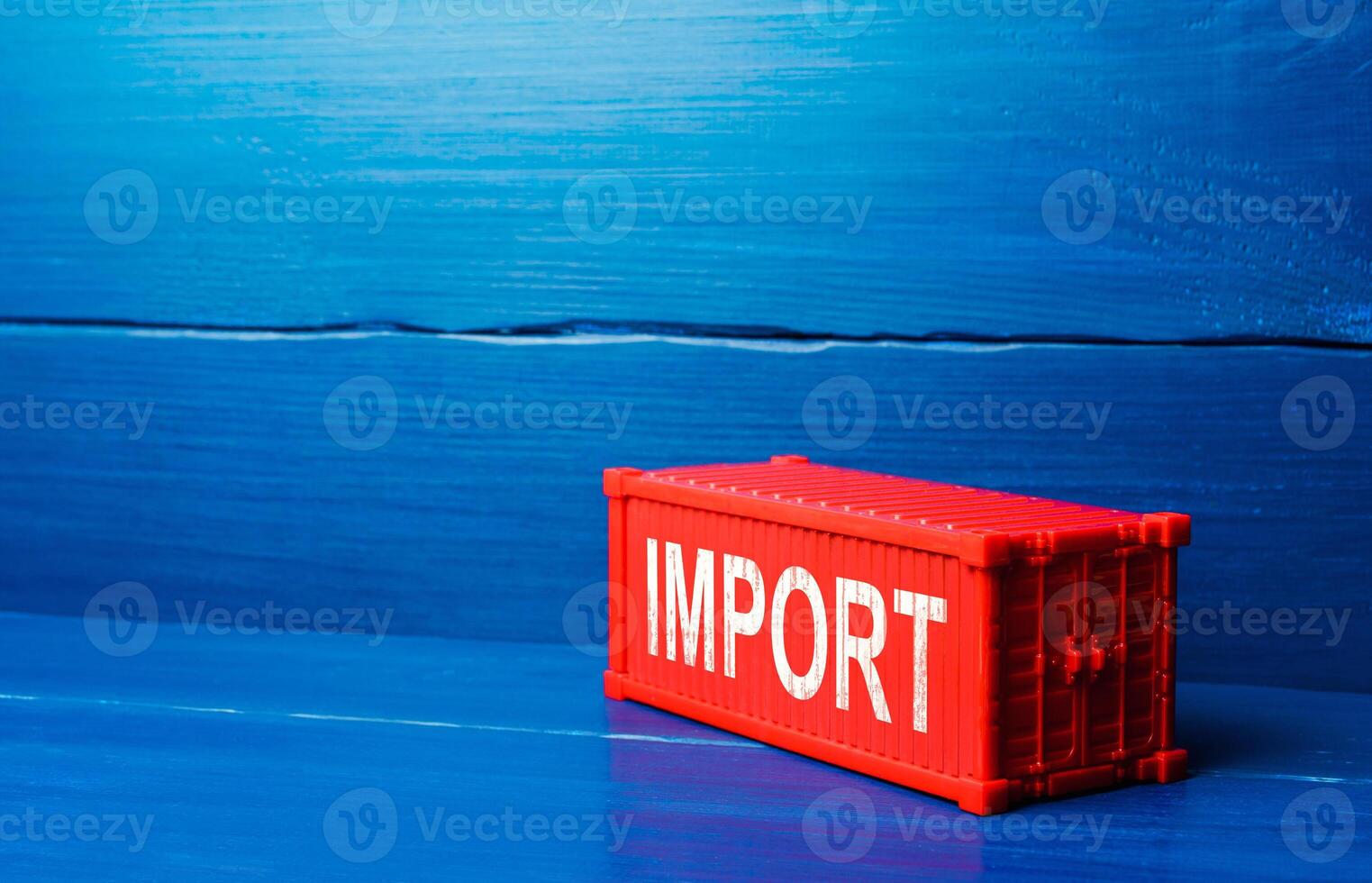 Red cargo ship container with word IMPORT. Admission of foreign goods to the national market, commercial globalization and global business. International trade, logistics. Economic processes photo