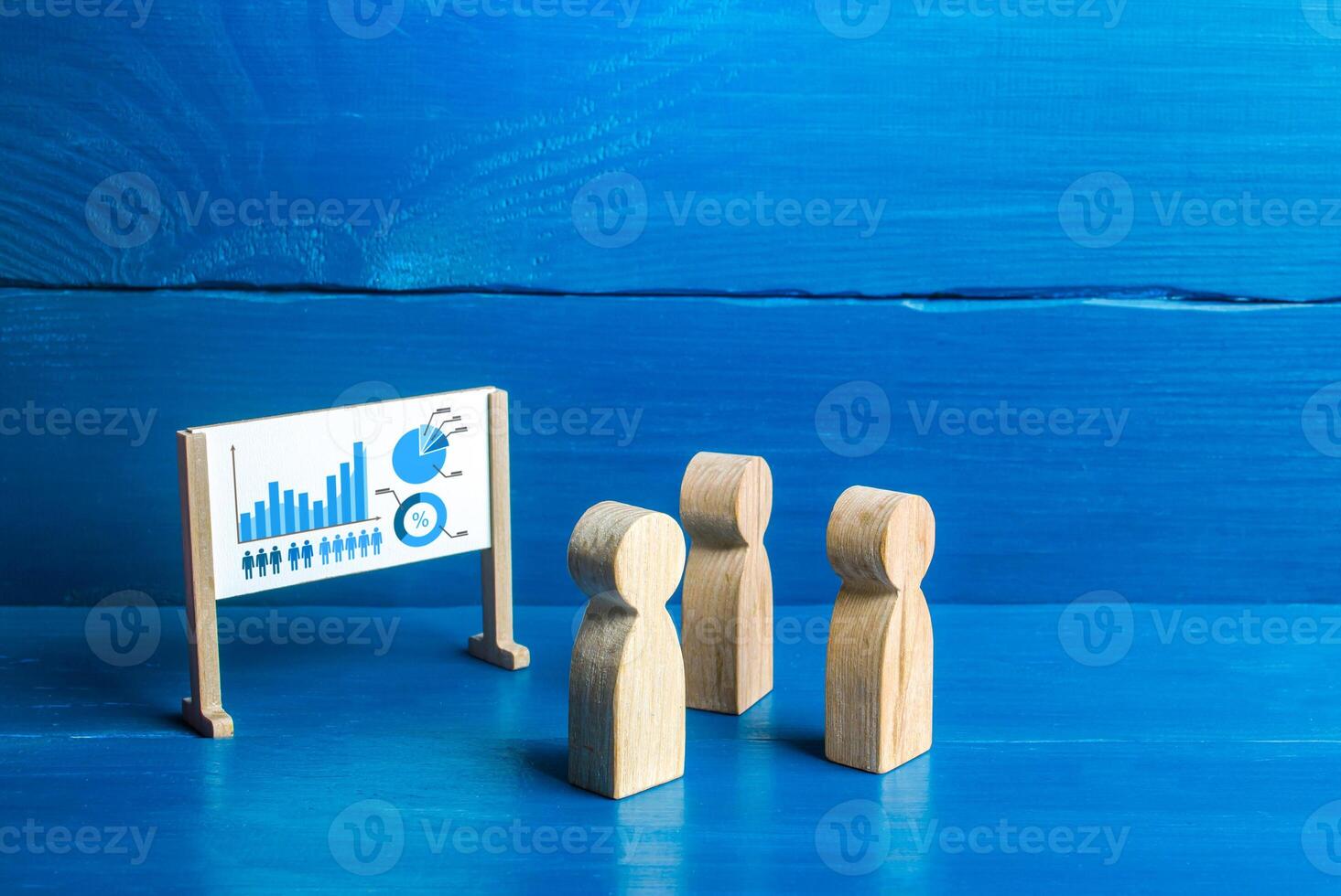 Figures of people are looking at the whiteboard with a diagram. Briefing and work meetup. Statistics analysis and marketing strategy development. Data review, market share. Training and coaching. photo