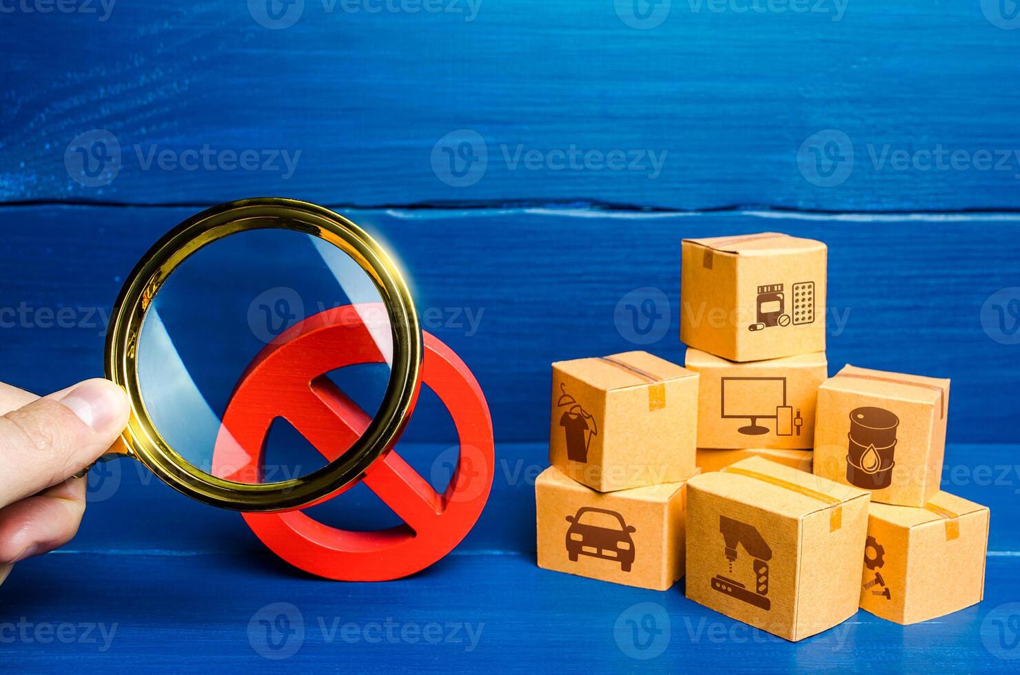 Man with a magnifying glass examines red prohibition sign NO near boxes. Assessment of damage from sanctions or embargo. Effect of restrictive measures. Protect national producers from foreign goods photo