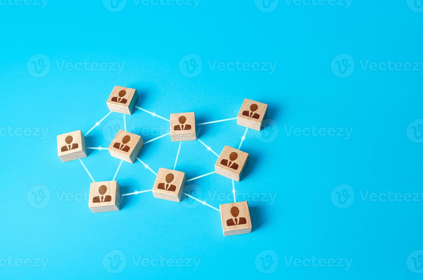 Network of connected employees figurines. Self-organized hierarchical business company system. Distribution responsibilities between workers. High autonomy. New wholeness social management strategies photo