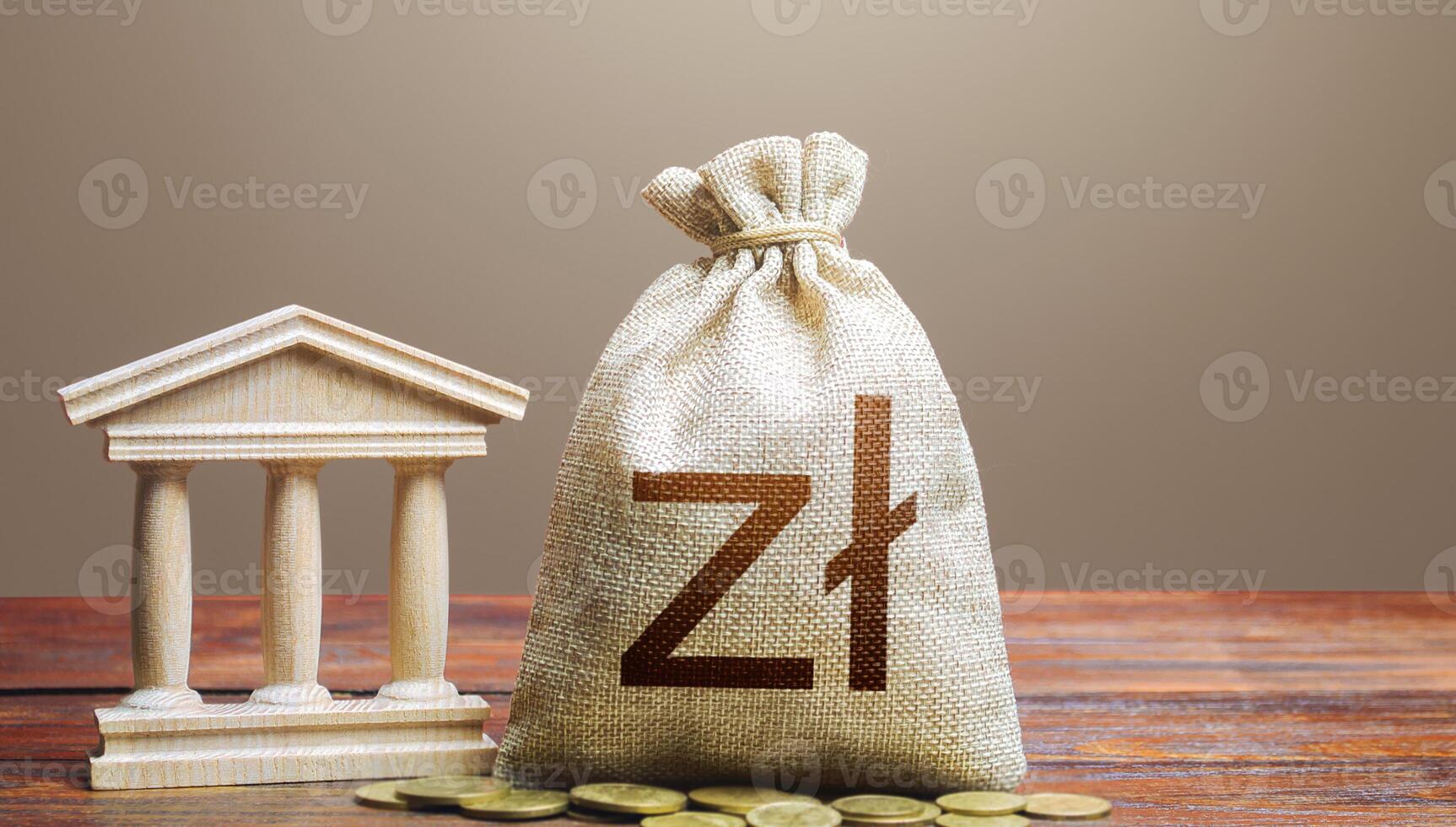 Polish zloty money bag and bank government building. Tax collection and budgeting. Lending loans, deposits. State debt. GDP and GNP. Monetary policy. Support businesses in times of crisis. photo