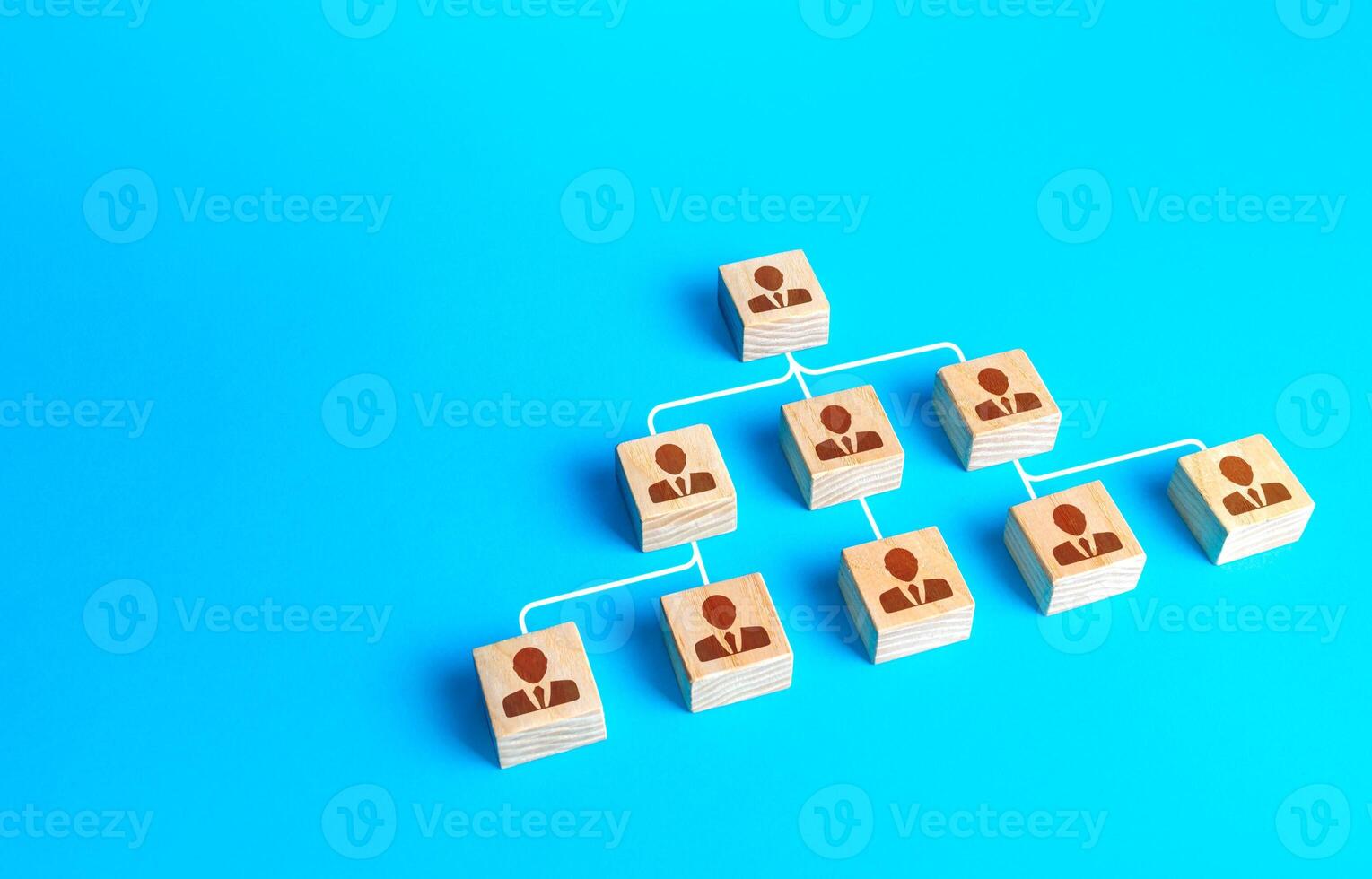 Traditional schematic visualization of the company structure from blocks with people. Business personnel management. Command and subordination. Effective optimization of company hierarchical system photo