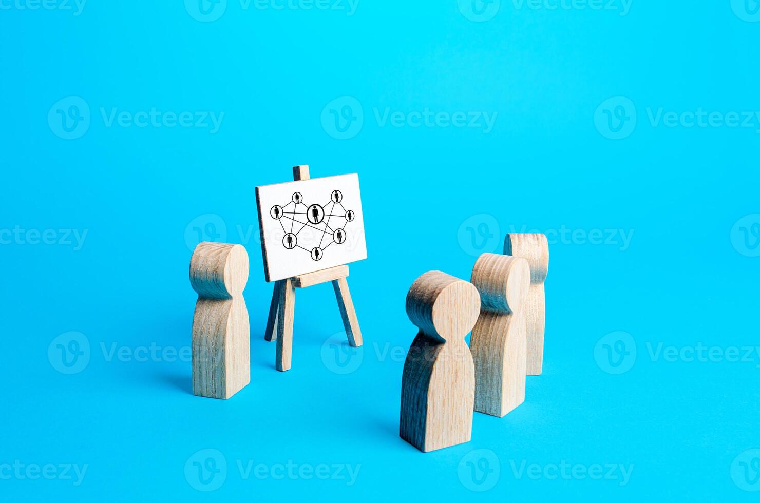 Figures of people looking at companys hierarchical system. Transition from traditional pyramidal comfort hierarchy. Unconventional company structure, distribution responsibilities between employees. photo
