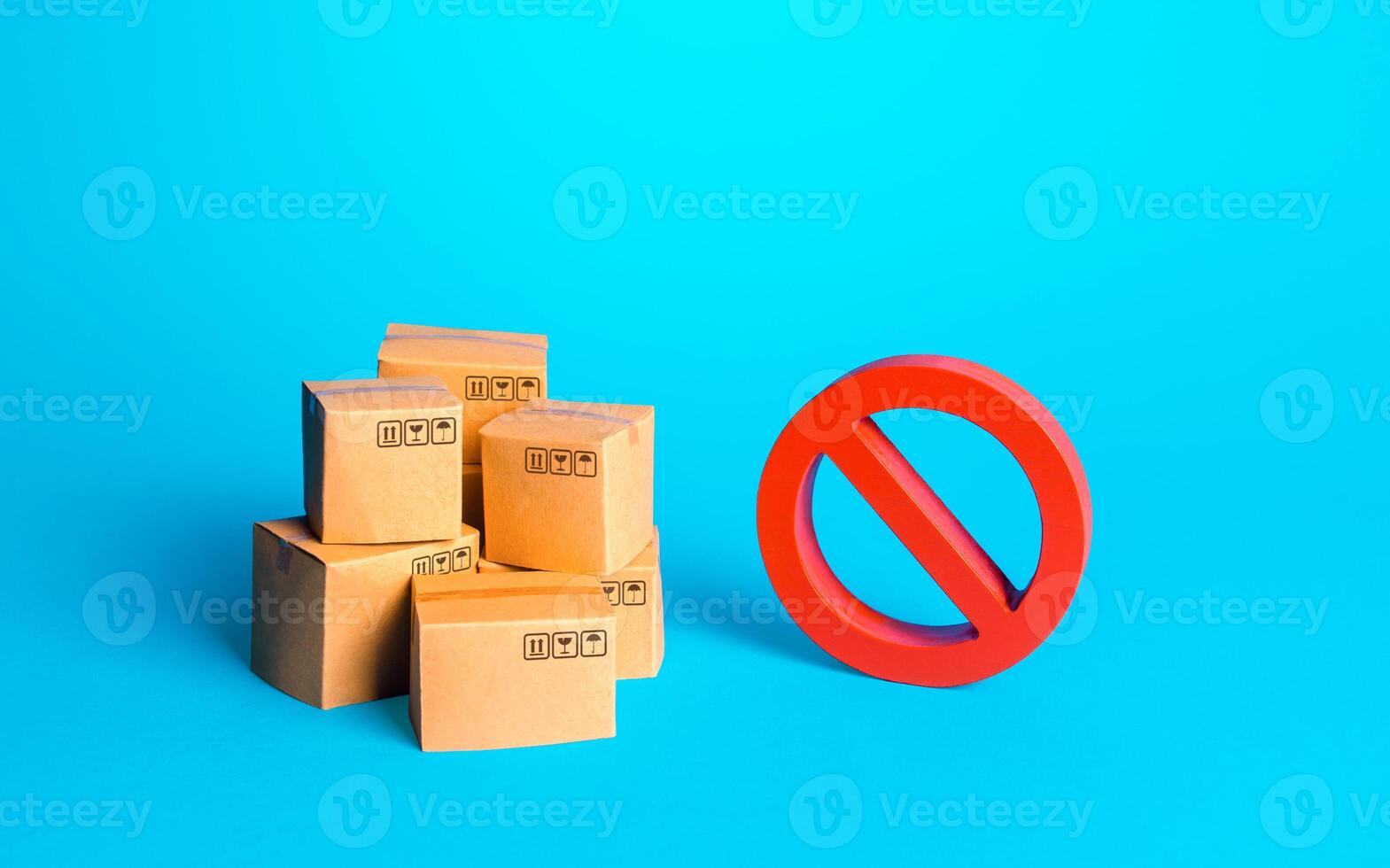 Carton boxes of goods and a red prohibition sign NO. Protection of national manufacturers. Bureaucratic and economic constraints on import-export operations of goods. Free trade market. Protectionism photo